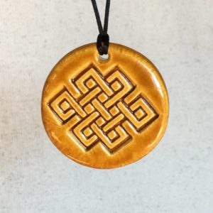 nœud infini en céramique unisexe tradition bouddhisme tibétain