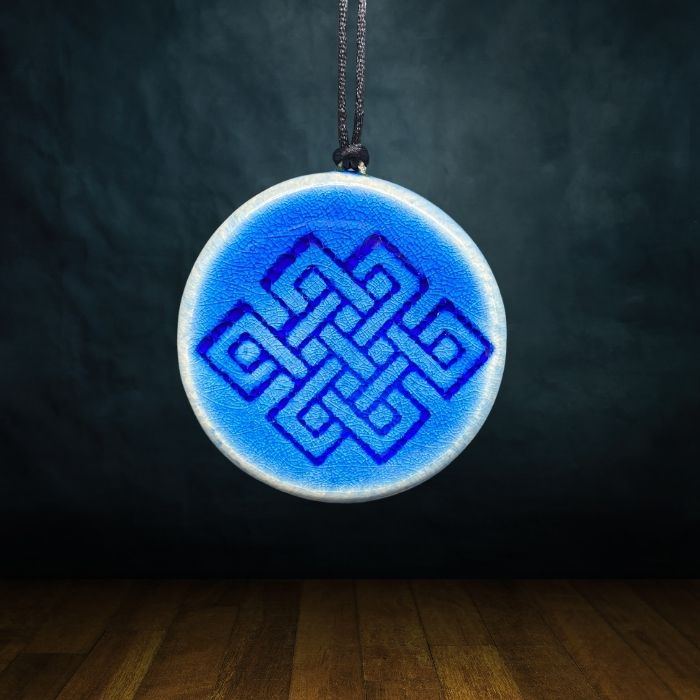 pendentif ceramique noeud infini bleu